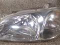фара левая Kia Carnival UP/GQ 2000 - фото №2