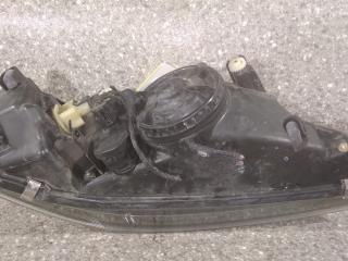 фара левая Mitsubishi Space Star 1 поколение [рестайлинг] 2004