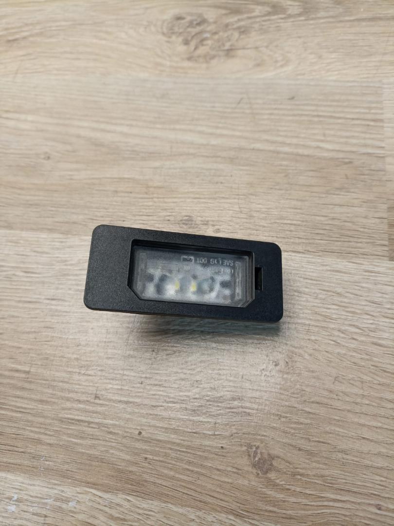 подсветка номера BMW 3 серия G20 2022, 2.0 л., B46 B20 B, бензин, АКПП, mineral-weiss metallic, седан, задний привод, 63269481841, 9481841 - фото №1