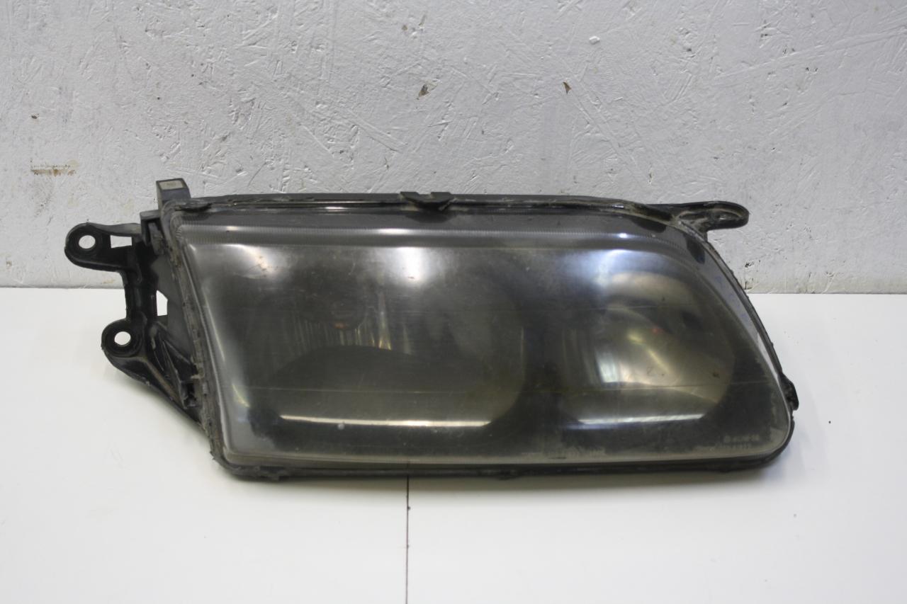 фара правая Mazda Capella 7 поколение GWEW 1998, 1.8 л., FP, бензин, АКПП, черный, универсал, передний привод, правый руль - фото №1