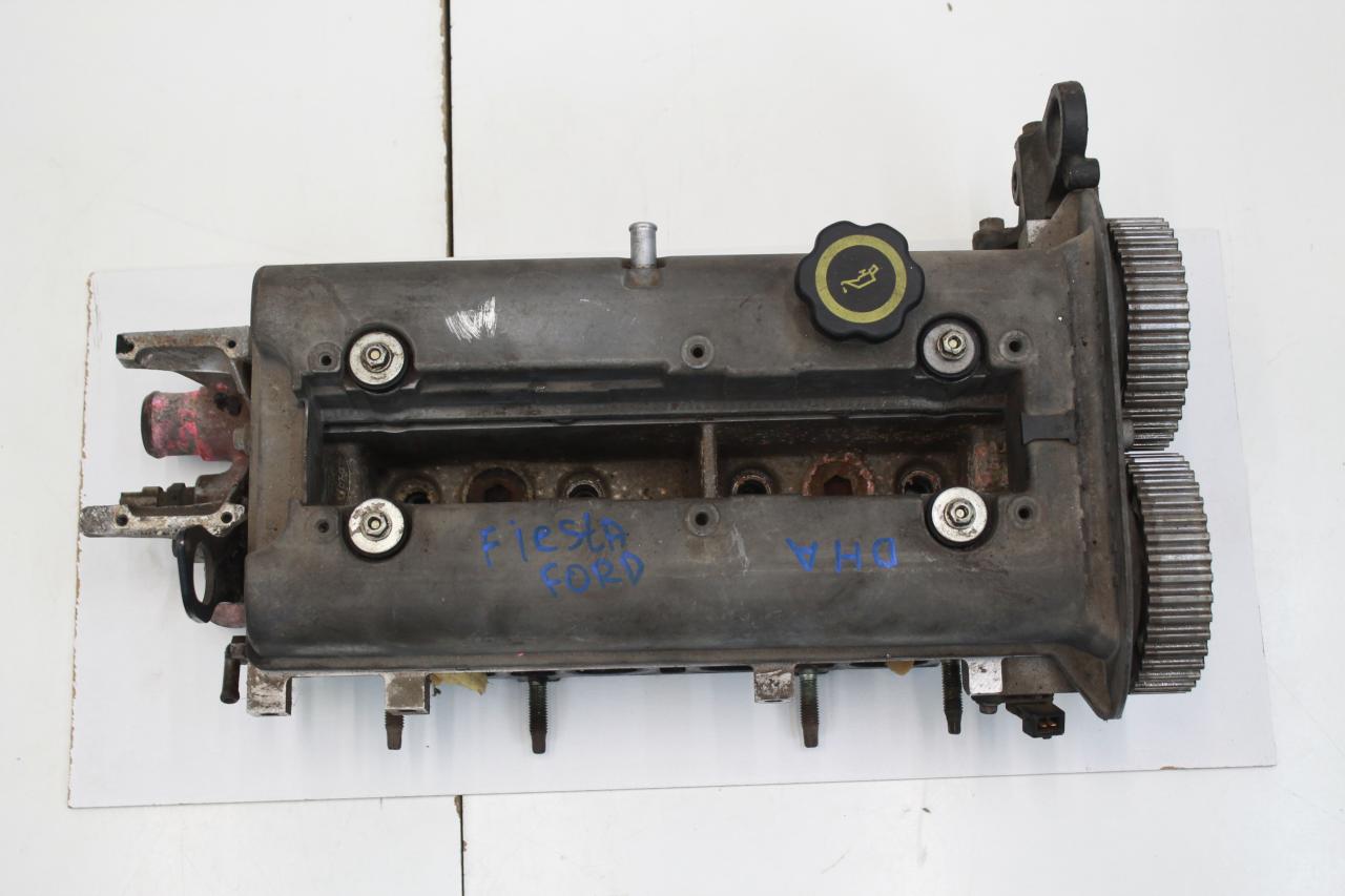 головка блока цилиндров Ford Fiesta 4 поколение AX 1998, 1.2 л., FSI, бензин, вариатор, черный, хетчбэк 5 дв., передний привод - фото №1