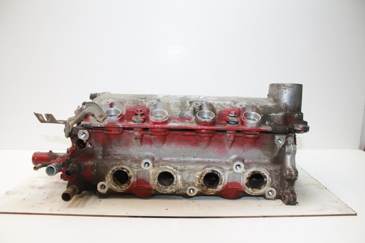 головка блока цилиндров Honda Fit Aria 1 поколение GD6 2002, 1.5 л., L15A, бензин, АКПП, серый, седан, передний привод, правый руль - фото №1