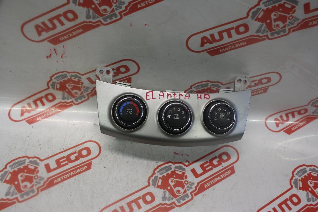 блок управления печки / климат-контроля Hyundai Elantra HD 2010, 1.6 л., G4FC, бензин, МКПП, белый, седан, передний привод, 972502H - фото №1