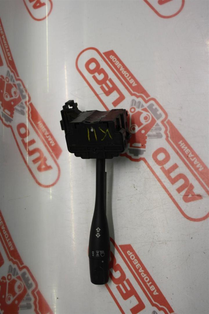 переключатель поворотов Nissan March K11 1997, 1.0 л., CG10DE, бензин, АКПП, белый, купе, передний привод, правый руль - фото №1