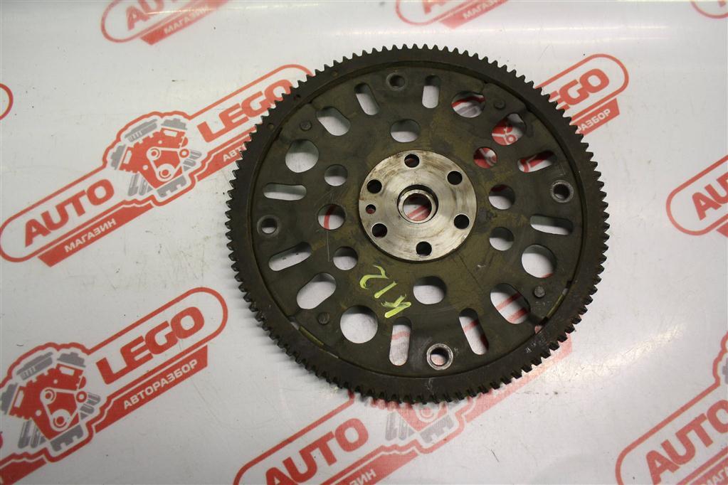 маховик Nissan March K12 AK11 2002, 1.2 л., CR12DE, бензин, АКПП, черный, хетчбэк 5 дв., передний привод, правый руль, 12331AX000 - фото №1