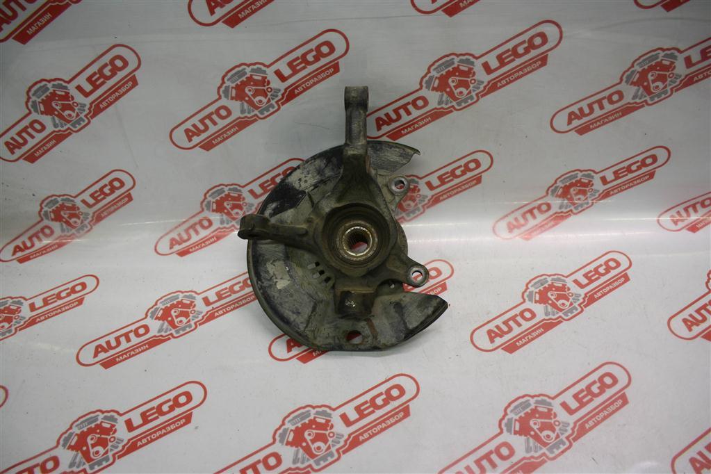 кулак поворотный левый Toyota Echo 1 поколение NCP10 2001, 1.5 л., 1NZ-FE, бензин, АКПП, желтый, седан, передний привод, 4321252010 - фото №1