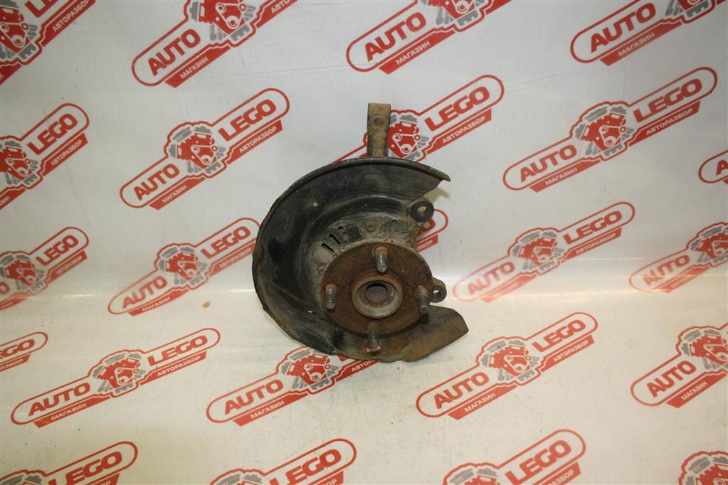 кулак поворотный правый Toyota Echo 1 поколение NCP10 2001, 1.5 л., 1NZ-FE, бензин, АКПП, желтый, седан, передний привод, 4321152010 - фото №1