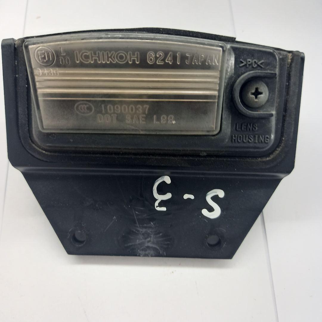 подсветка номера Nissan Murano Z51 Wagon 2010, 3.5 л., VQ35DE, бензин, вариатор, (kh3) black, внедорожник 5 дв., передний привод, 26510-AR00A - фото №1