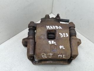 суппорт передний левый Mazda 323 6 поколение 1998