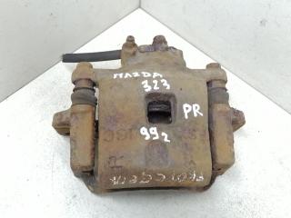 суппорт передний правый Mazda 323 6 поколение 1999