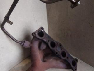 коллектор выпускной Mazda 323F BA 1996, 1.5 л., i, Z5-DE, бензин, МКПП, зеленый, хетчбэк 5 дв., передний привод