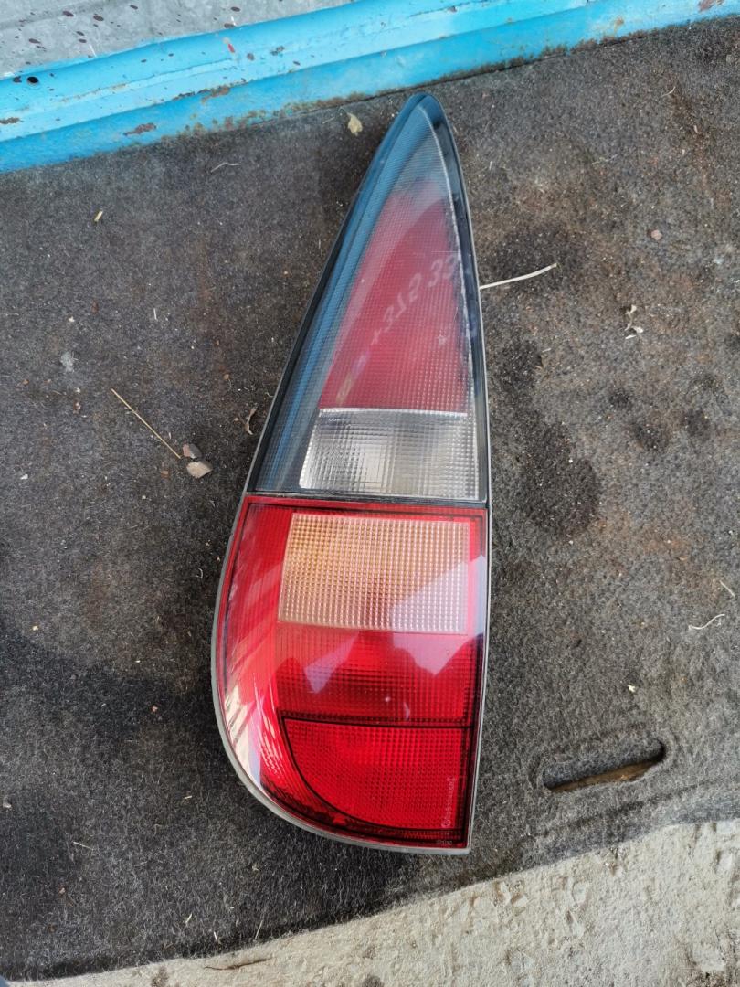 фонарь задний левый Renault Laguna 1 поколение 1997, 2.0 л., F3R 768, бензин, МКПП, красный, универсал - фото №1