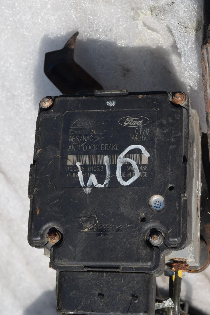 блок ABS Ford Focus 1 поколение 2000, 1.6 л., бензин, 10094801053 - фото №1