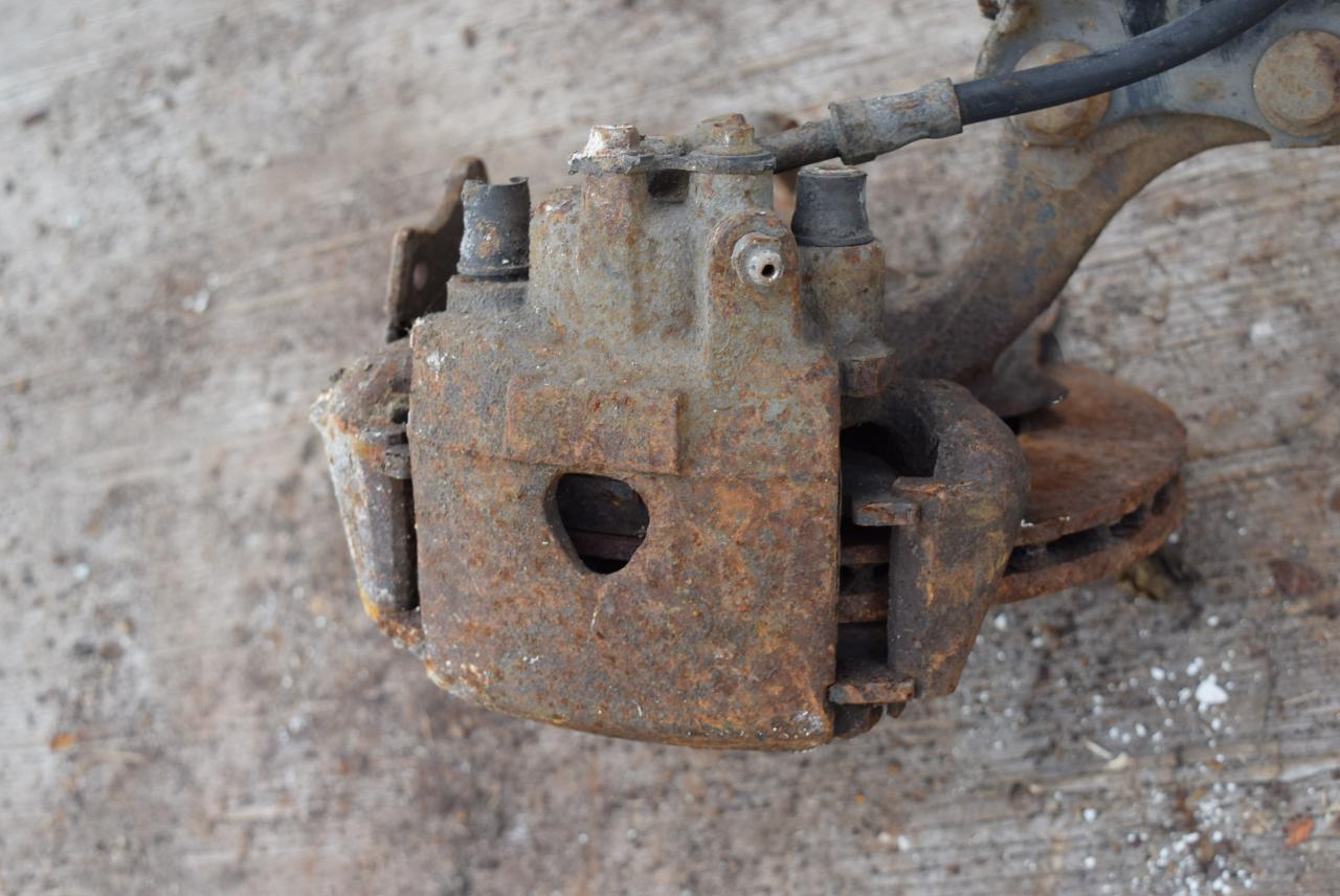 суппорт передний левый Volkswagen Golf 4 поколение 1999, 1.9 л., AGP, дизель, МКПП, хетчбэк 5 дв. - фото №1