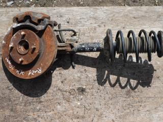 амортизатор передний левый Nissan Almera N16 2001, 1.8 л., бензин