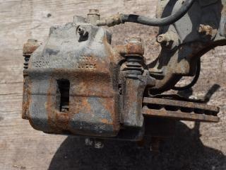 суппорт передний левый Nissan Almera N16 2001, 1.8 л., бензин