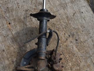 амортизатор передний левый Nissan Serena С23 [2-й рестайлинг] 1999, 1.6 л., бензин