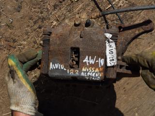 суппорт передний левый Nissan Almera Tino V10 2000, 2.2 л., дизель