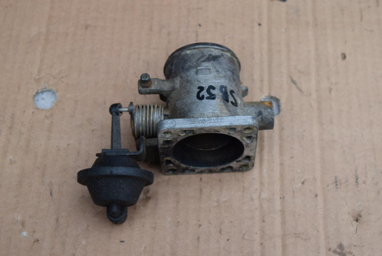 заслонка дроссельная Kia Rio 2 поколение 2006, 1.5 л., дизель, МКПП, хетчбэк 5 дв., 351002XXX - фото №1