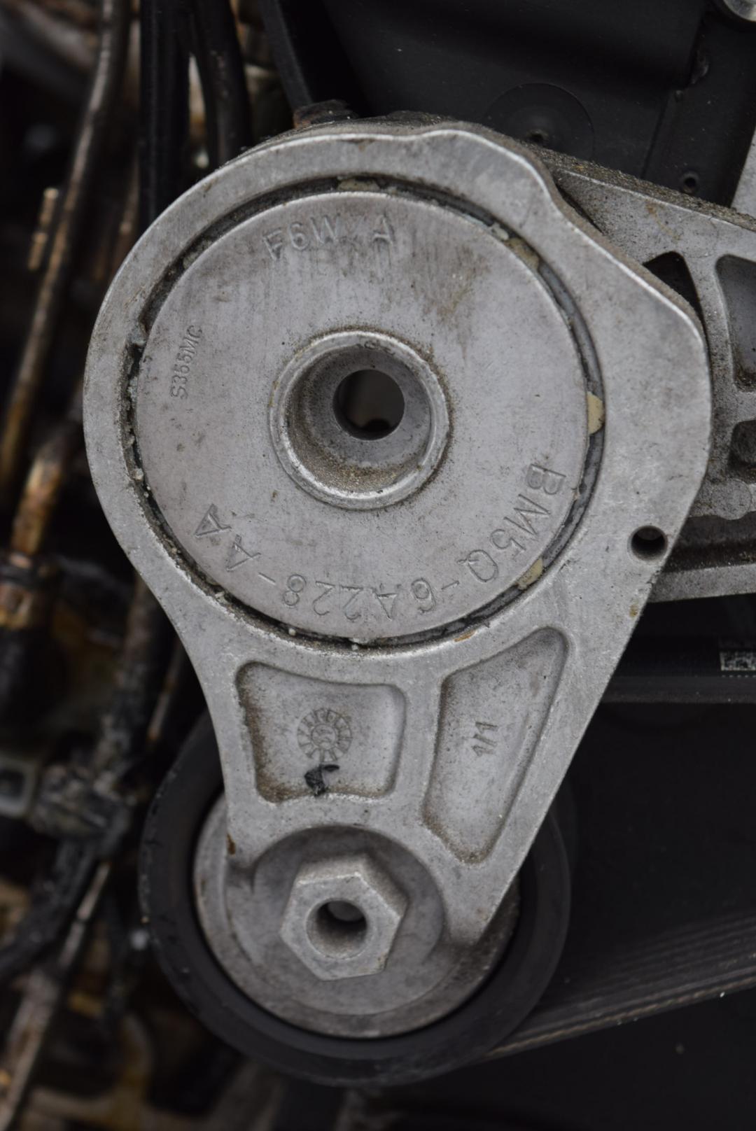 натяжитель Volvo V60 1 поколение 2012, 1.6 л., B 4164 T3, бензин, робот, черный, универсал, передний привод, правый руль, BM5Q6A228AA - фото №1