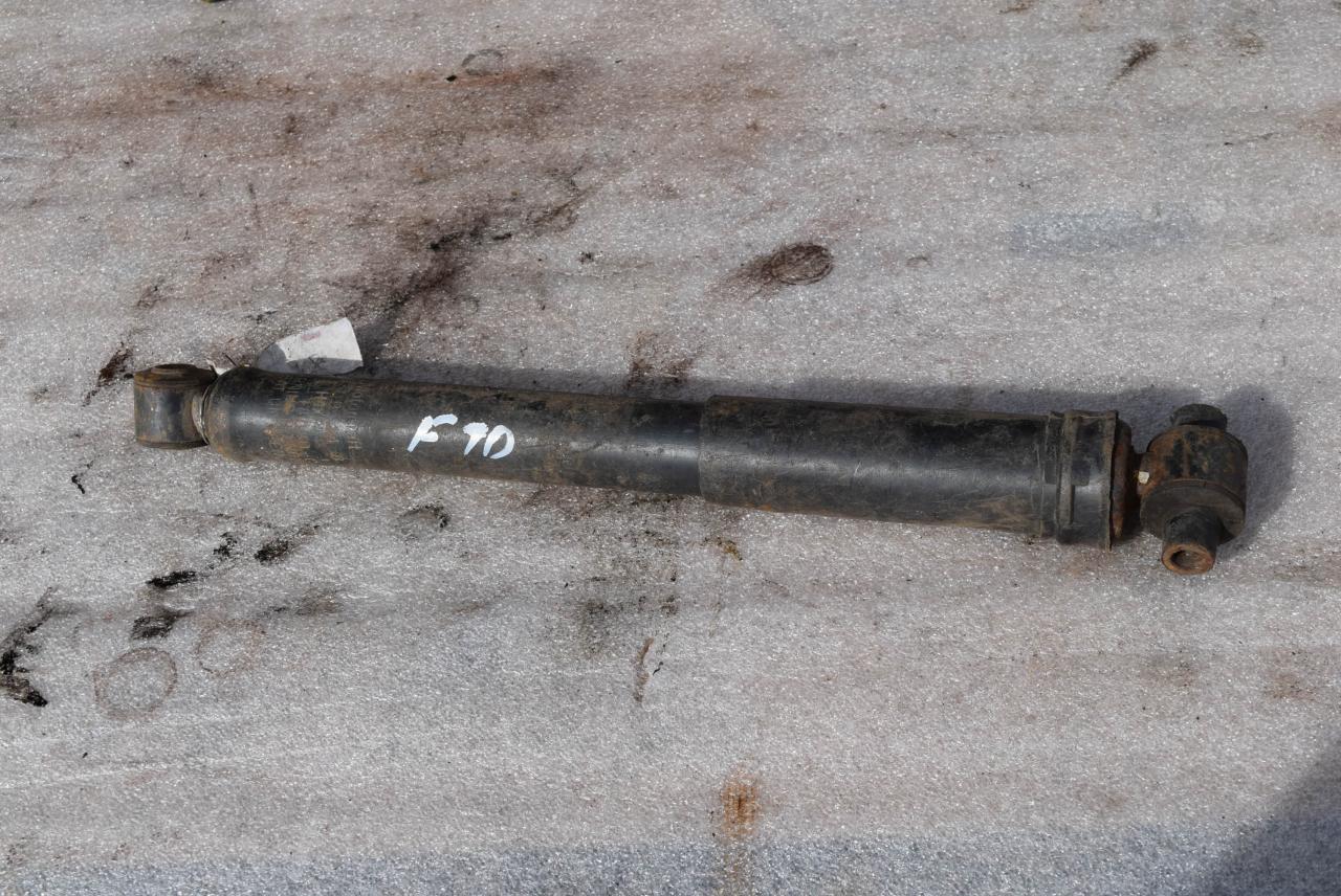 амортизатор задний Ford Focus 1 поколение 1999, 1.8 л., бензин, универсал, 98AG18080CJ - фото №1