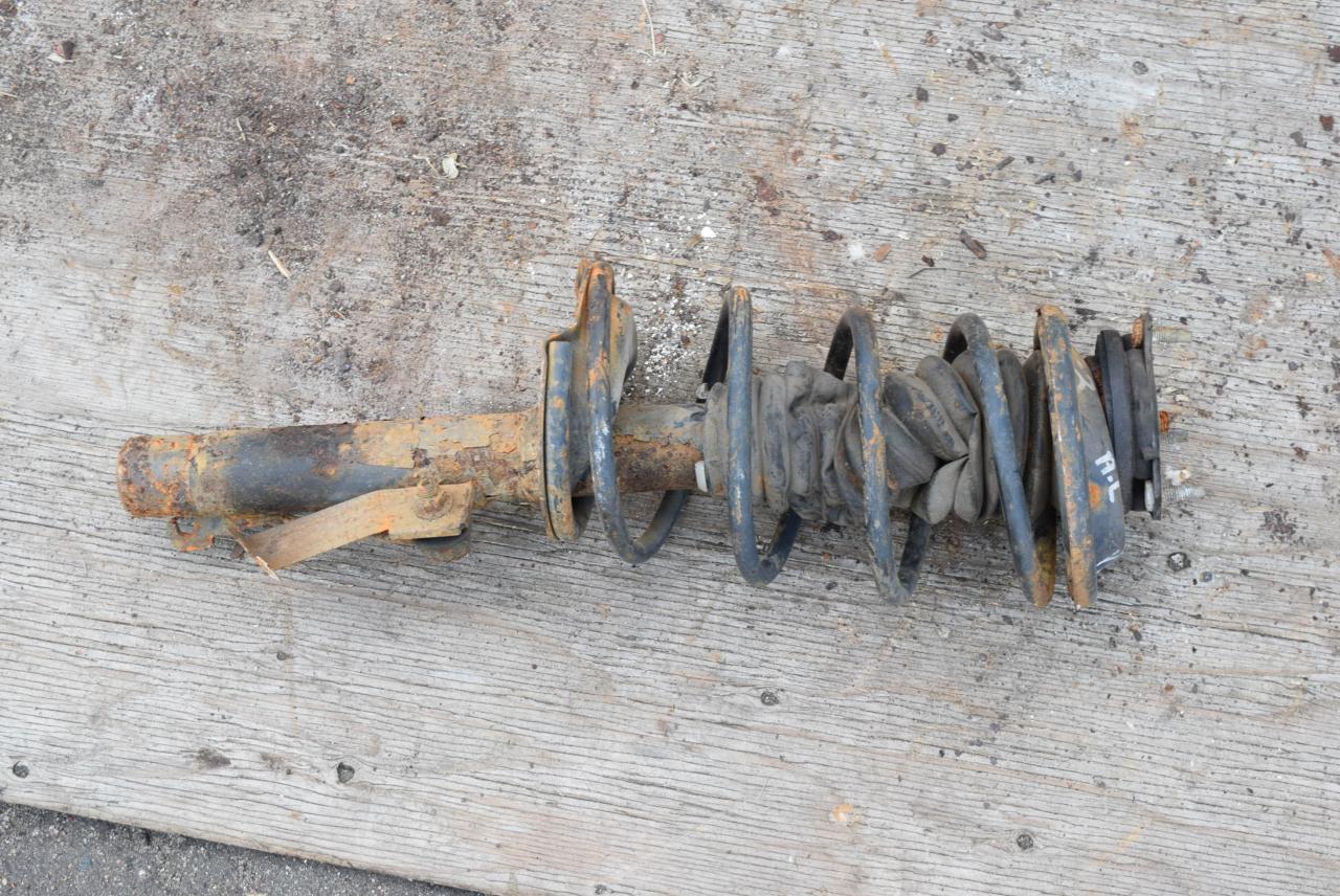 амортизатор передний левый Ford Focus 1 поколение 1999, 1.8 л., дизель, седан - фото №1