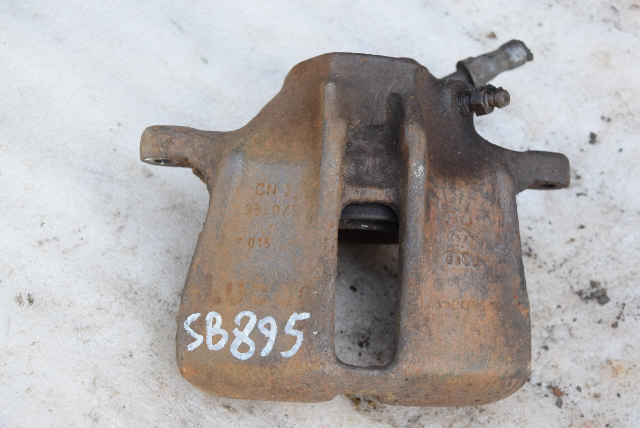 суппорт передний левый Volkswagen Caddy 2 поколение 1998, 1.6 л., бензин, МКПП - фото №1