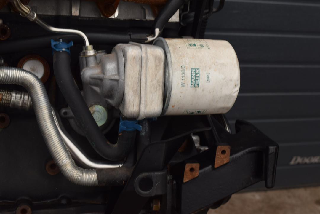 теплообменник масляного фильтра Volvo S80 1 поколение 2000, 2.5 л., D 5252 T, дизель, МКПП, седан, 074115417E - фото №1