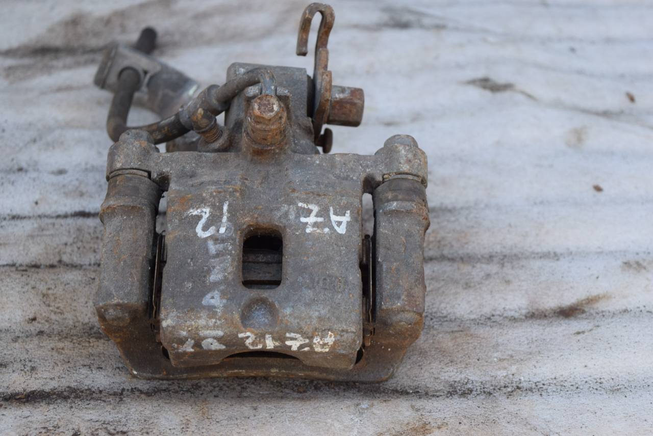 суппорт задний левый Kia Picanto 1 поколение 2004, 1.1 л., бензин, АКПП - фото №1