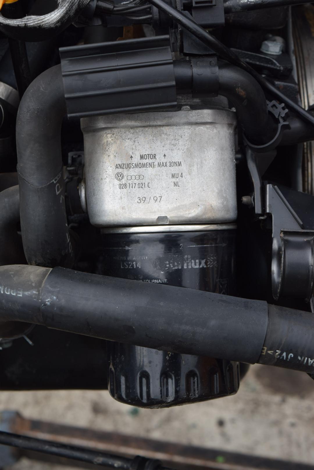 теплообменник масляного фильтра Volkswagen Golf 3 поколение 1997, 1.9 л., TDi, AFN, дизель, МКПП, универсал, 028117021C - фото №1