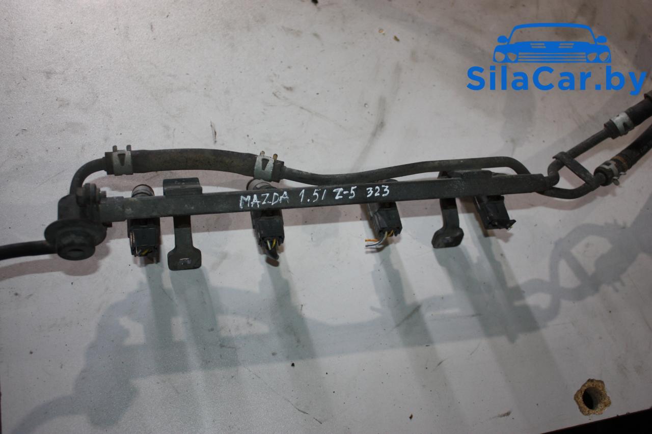 форсунка Mazda 323 BA 1995, 1.5 л., бензин, 1955003110 - фото №1