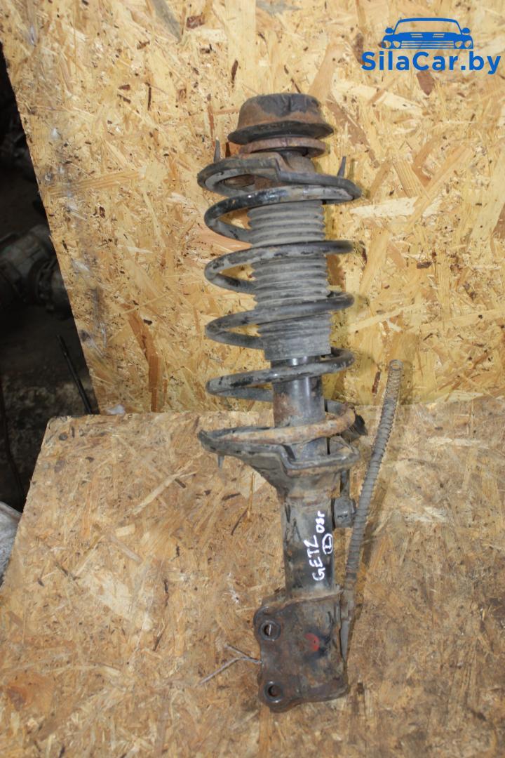 стойка передняя левая Hyundai Getz 1 поколение 2003 - фото №1