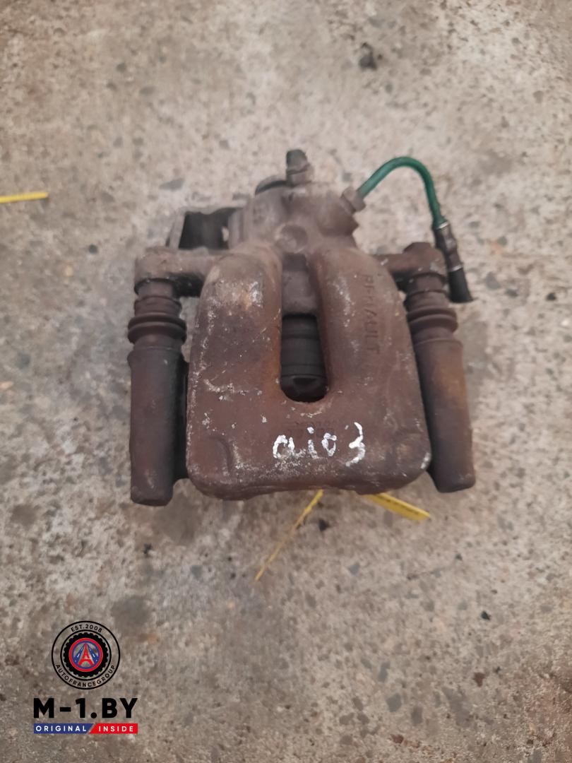 суппорт задний левый Renault Clio 3 поколение (2005 - 2009) - фото №1