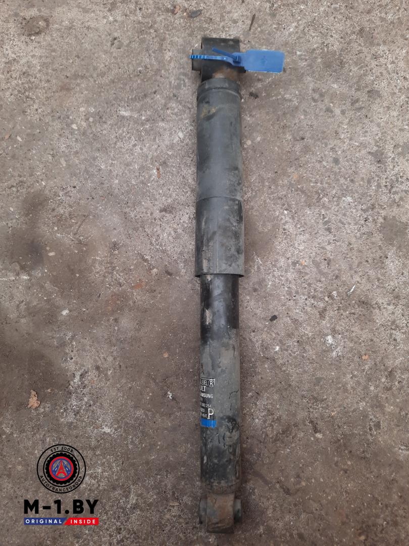 амортизатор задний левый Renault Koleos 1 поколение 2011 - фото №1