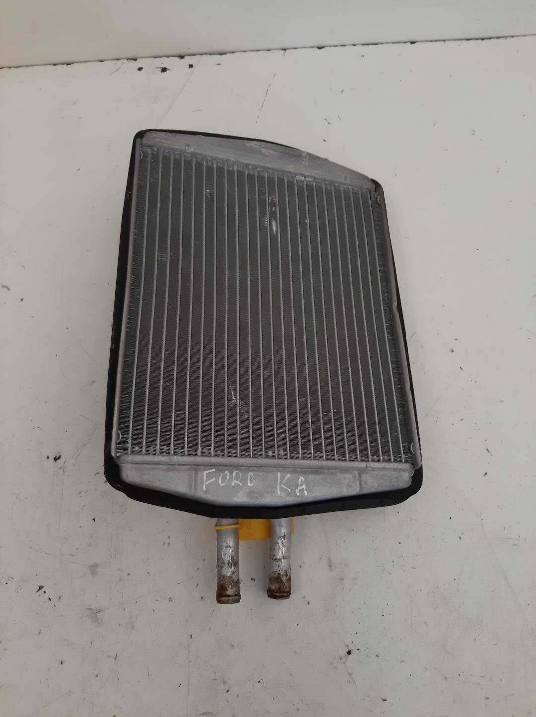 радиатор отопителя (печки) Ford Ka 1 поколение 1996, 1.3 л., бензин - фото №1