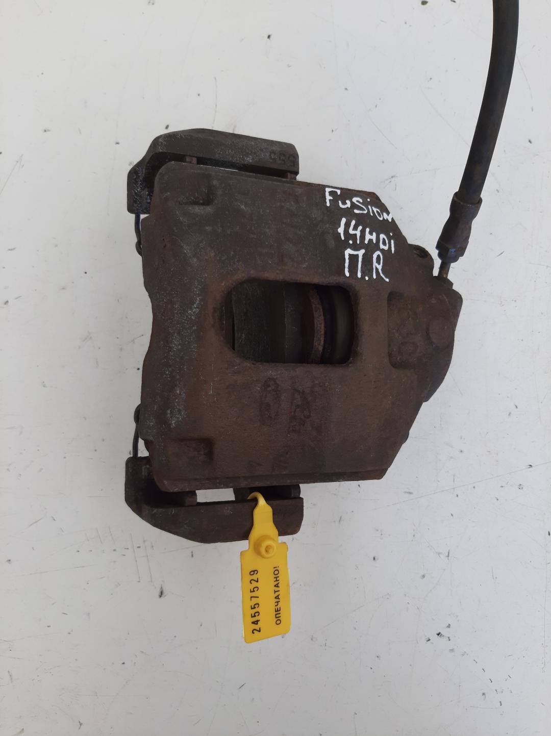 суппорт передний правый Ford Fusion 1 поколение 2002, 1.4 л., дизель - фото №1