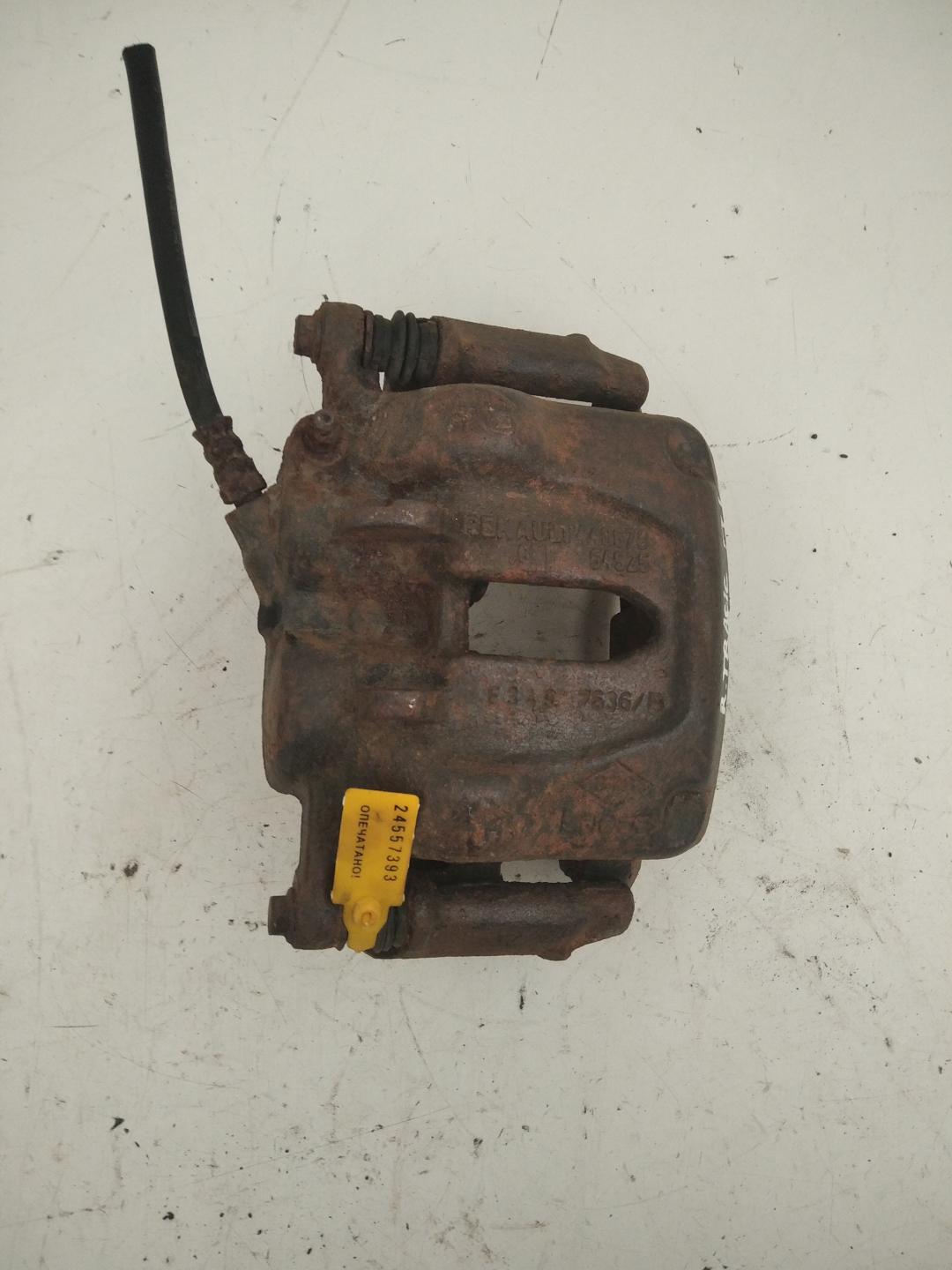 суппорт передний левый Renault Trafic 2 поколение 2004, 1.9 л., дизель - фото №1