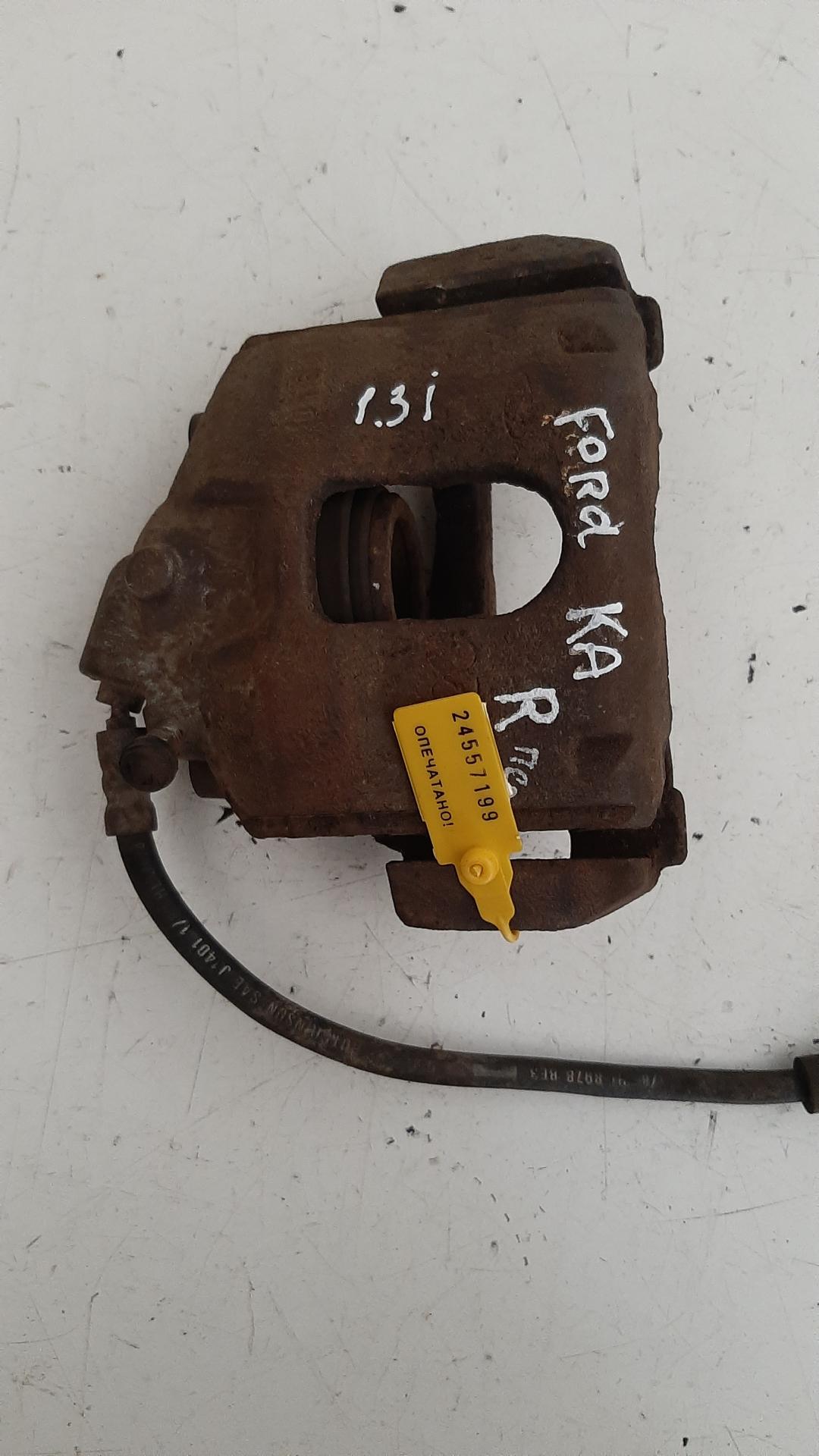 суппорт передний правый Ford Ka 1 поколение 1998, 1.3 л., бензин - фото №1