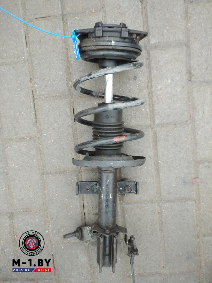 стойка передняя левая Renault Clio 3 поколение (2005 - 2009), 1.5 л., дизель - фото №1