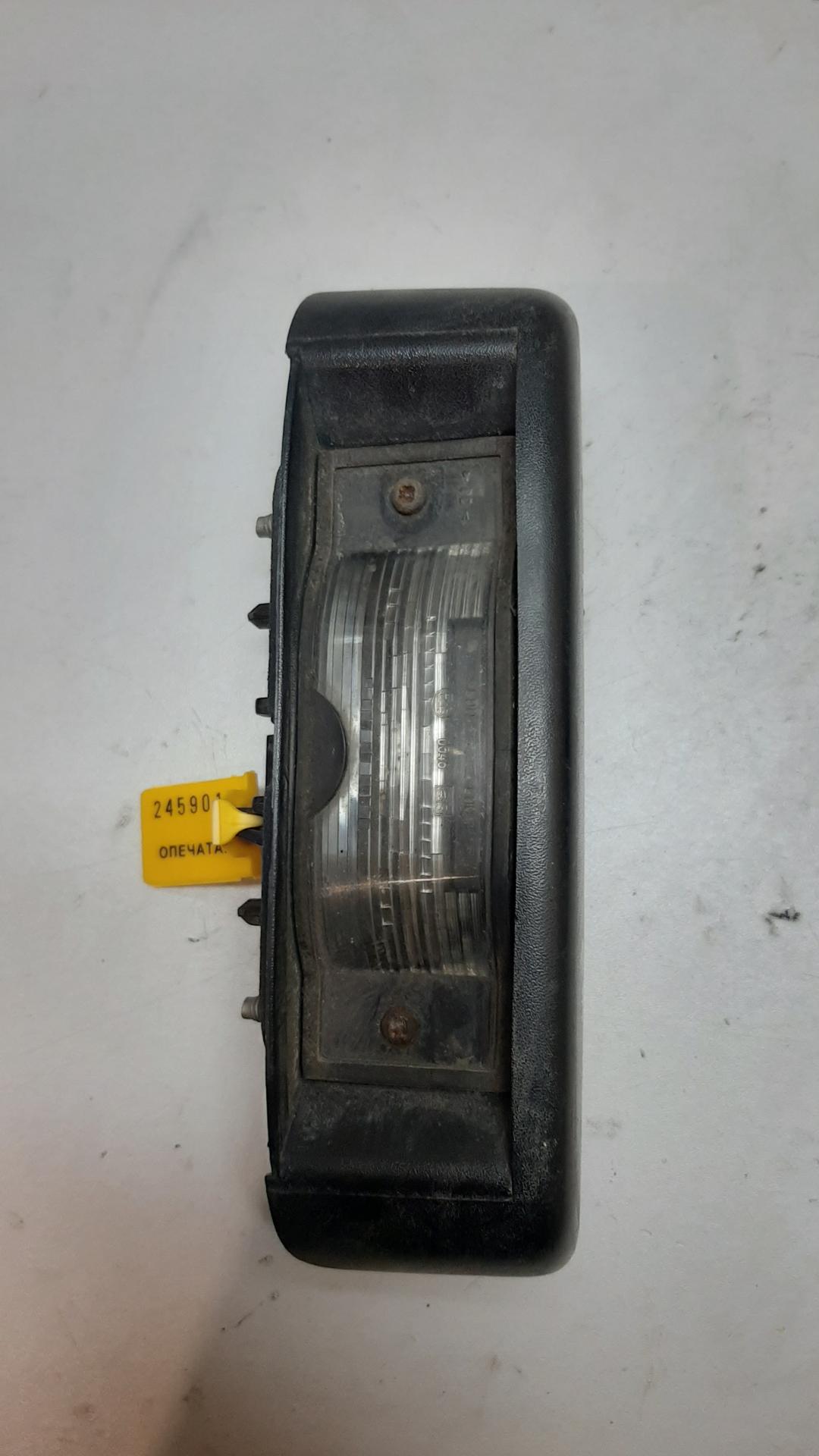 подсветка номера Renault Trafic 2 поколение 2002, 8200211477 - фото №1