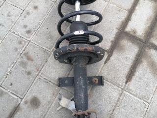 амортизатор передний левый Renault Clio 3 поколение (2005 - 2009)