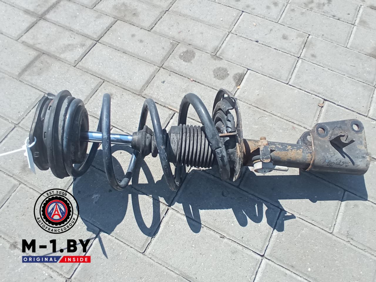 стойка передняя левая Renault Laguna 2 поколение (2001 - 2005) - фото №1