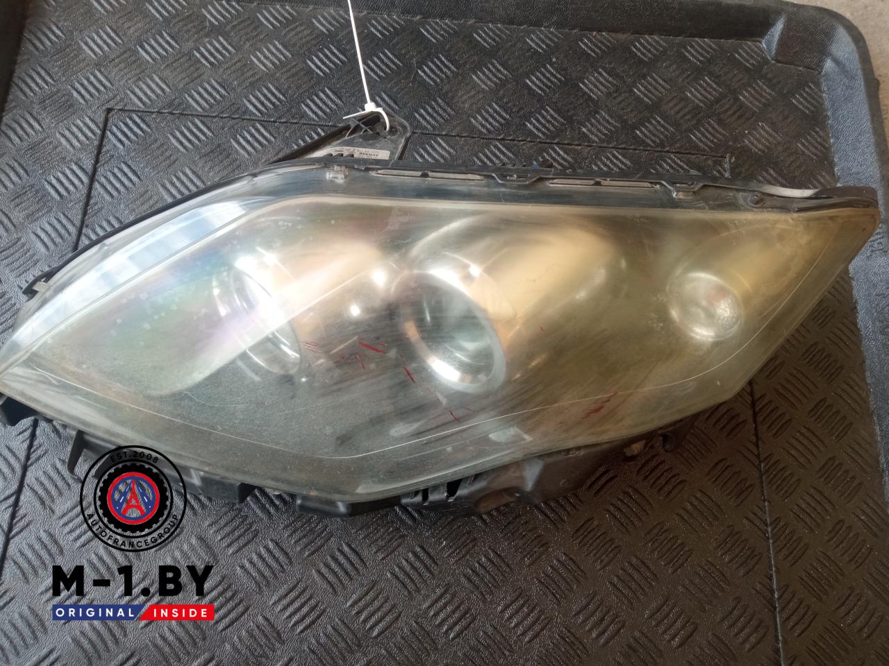 фара левая Renault Laguna 3 поколение 2009 - фото №1
