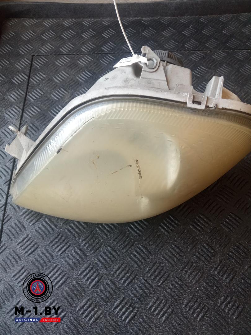 фара левая Renault Master 2 поколение (1998 - 2003) - фото №1