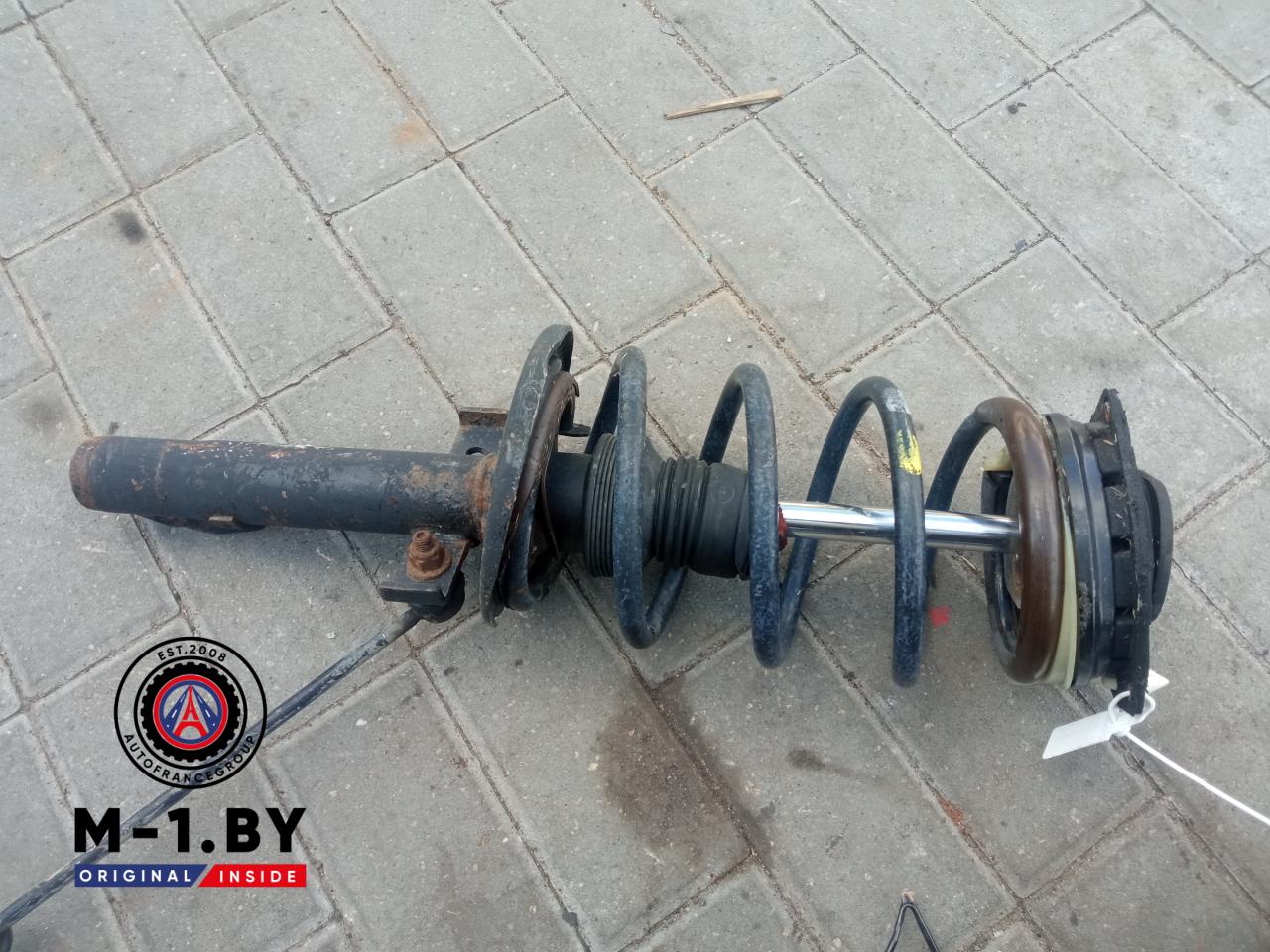 стойка передняя левая Renault Megane 2 поколение (2002 - 2006) - фото №1