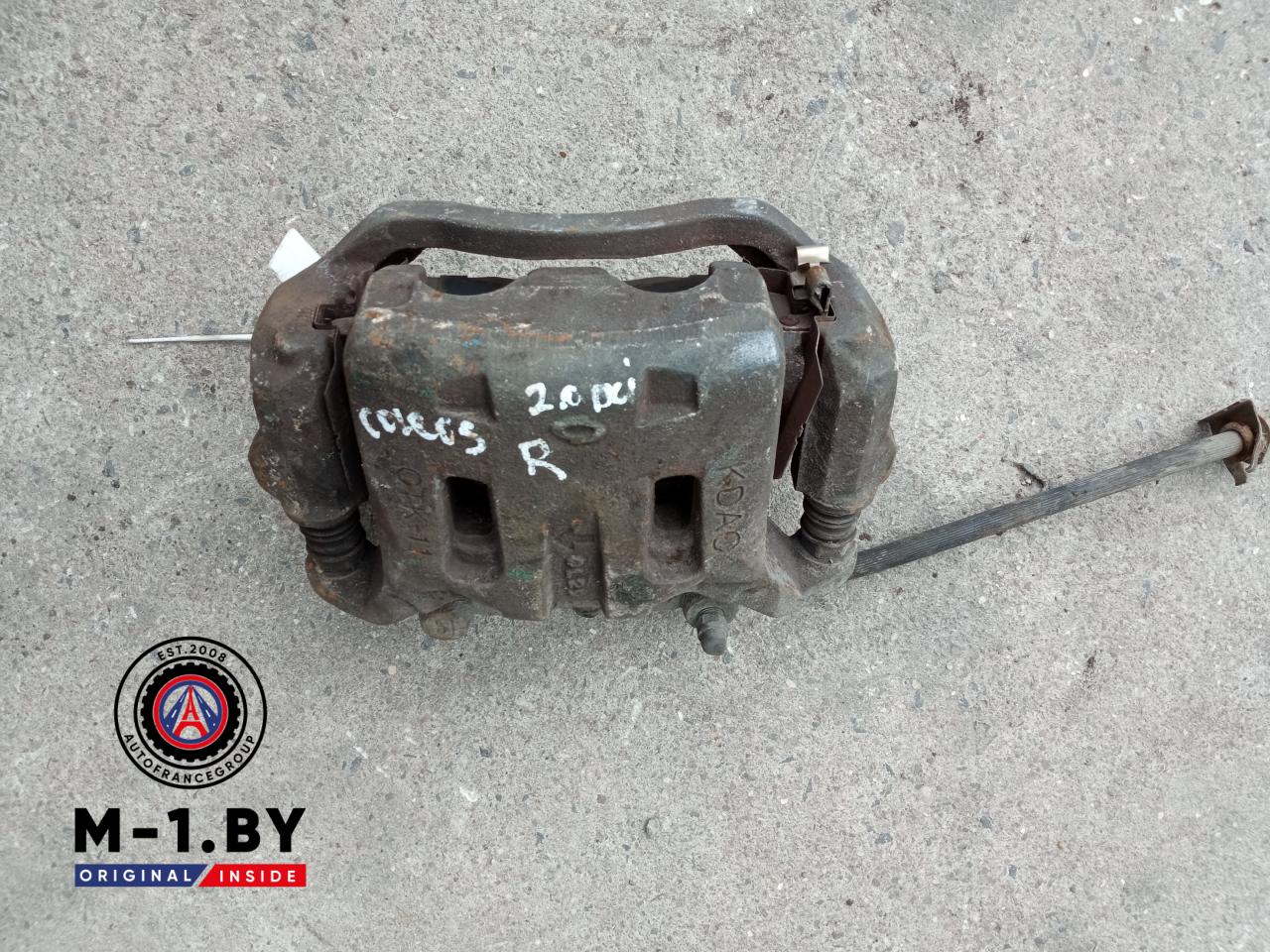 суппорт передний правый Renault Koleos 1 поколение (2008 - 2011) - фото №1