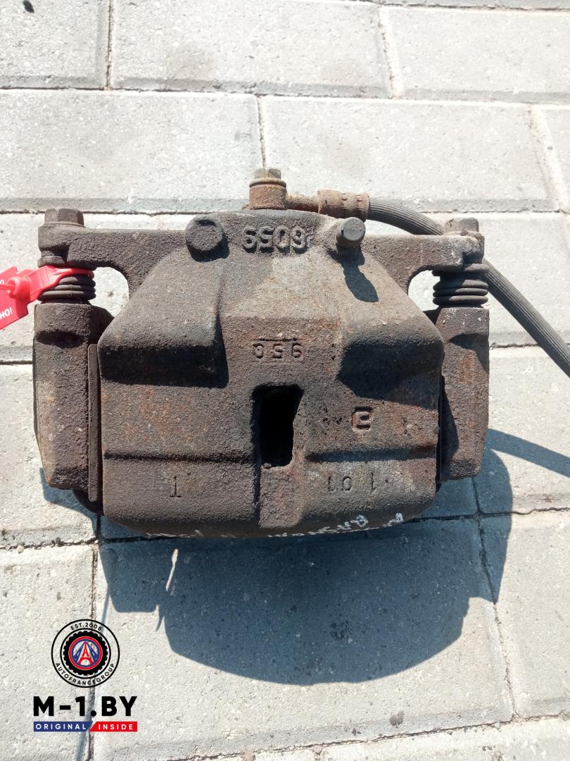 суппорт передний левый Nissan Qashqai 1 поколение (2006 - 2010), 1.5 л., дизель - фото №1