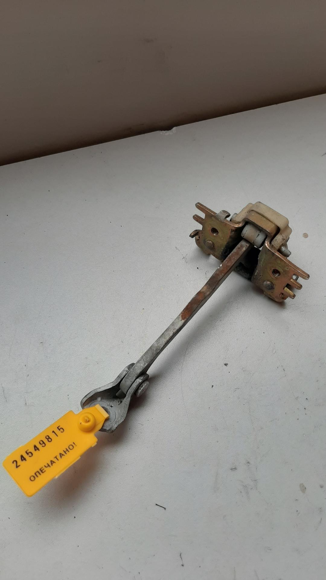 ограничитель открывания двери Renault Laguna 2 поколение 2002 - фото №1