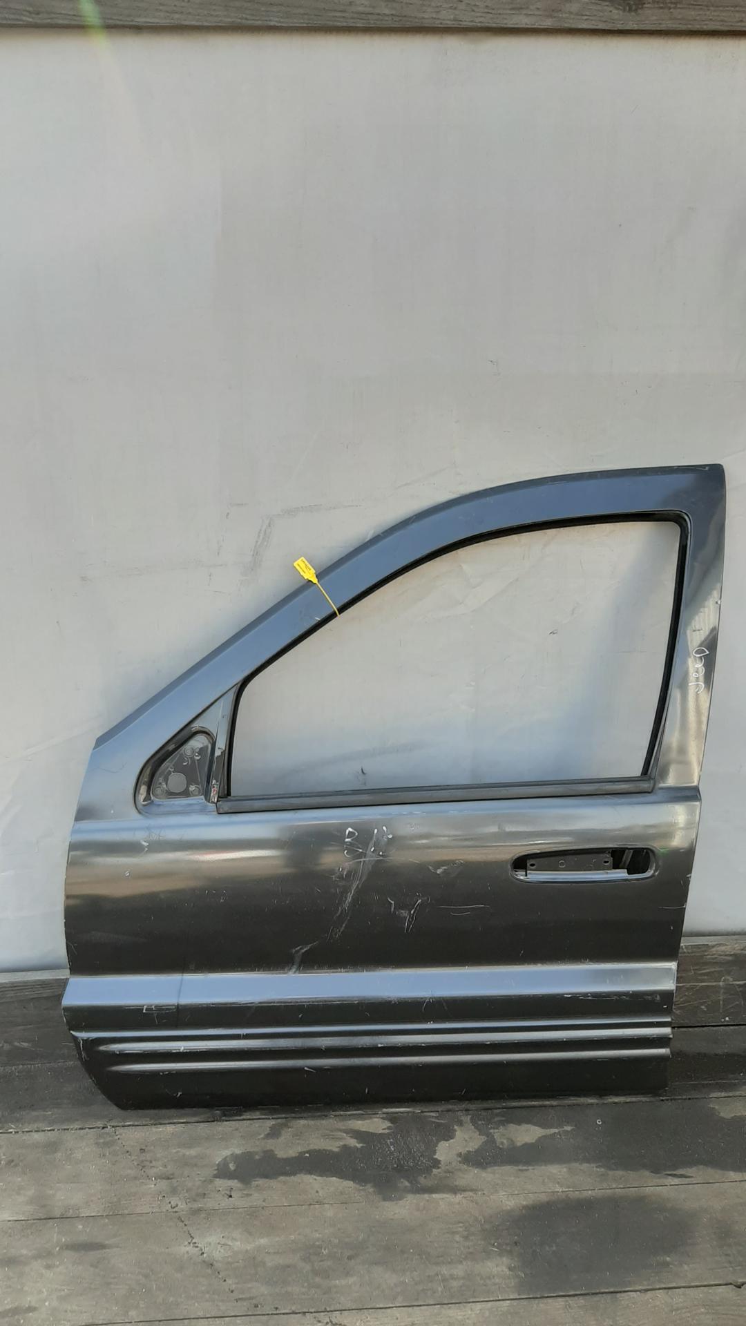 дверь передняя левая Jeep Grand Cherokee WJ 2001 - фото №1