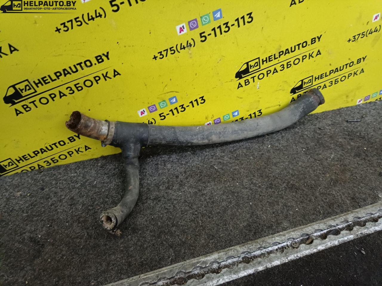 патрубок радиатора Audi 80 8C/B4 1991, 2.0 л., i, бензин, МКПП, седан, передний привод - фото №1
